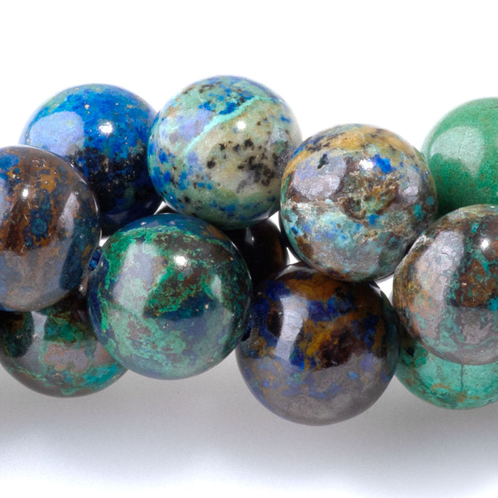 This is a Dakota Stones 10mm Azurite Gemstone strand with A grade round beads in 15-16 inch strand.