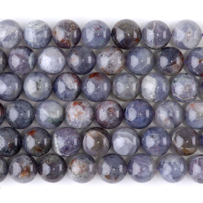 This is a Dakota Stones 10mm Bloody Iolite Gemstone strand with A grade round beads in 15-16 inch strand.