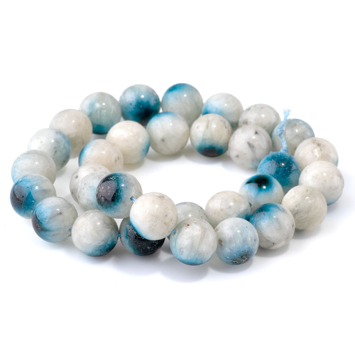This is a Dakota Stones 12mm Blue Ice Glaciertite Gemstone strand with A grade round beads in 15-16 inch strand.