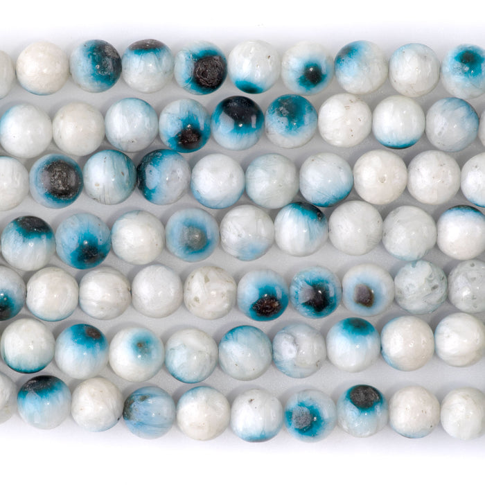 This is a Dakota Stones 8mm Blue Ice Glaciertite Gemstone strand with A grade round beads in 15-16 inch strand.