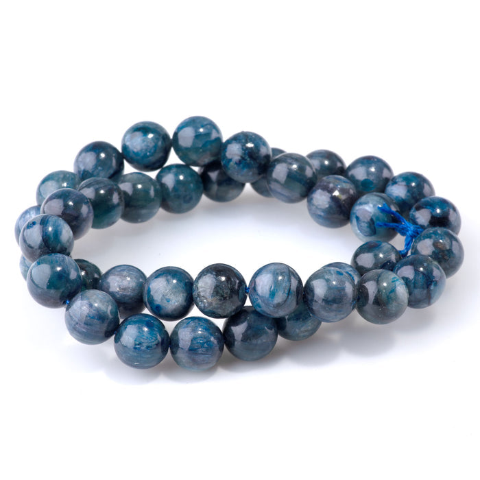This is a Dakota Stones 10mm Blue Kyanite Gemstone strand with round beads in 15-16 inch strand.
