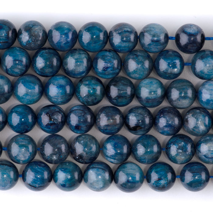 This is a Dakota Stones 10mm Blue Kyanite Gemstone strand with round beads in 15-16 inch strand.