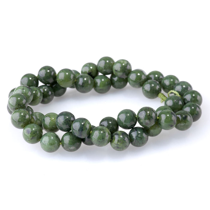This is a Dakota Stones 8mm Canadian Jade Gemstone strand with AA grade round beads in 15-16 inch strand.