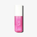 Pink bottle with white cap labeled 'Love Pom' by Ellis Brooklyn on an off-white background.