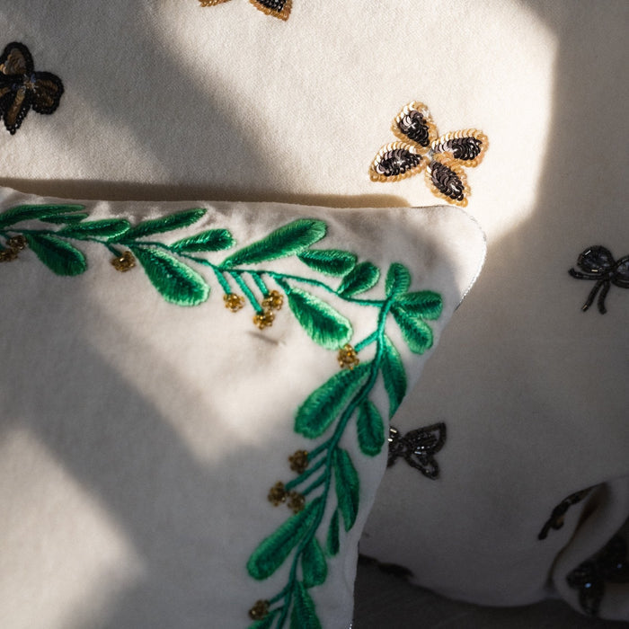 Embroidered Mistletoe Velvet Decorative Pillow in Cream by Joanna Buchanan — 20″ × 10″