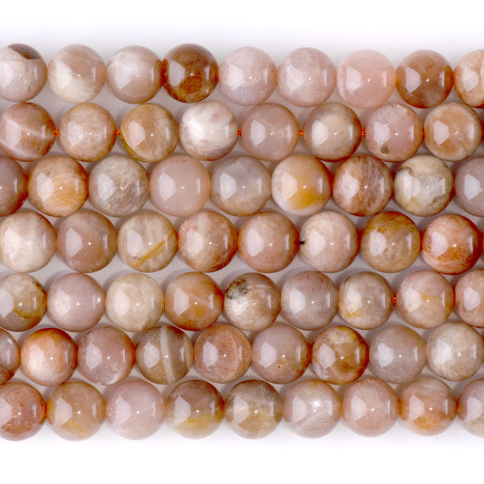 This is a Dakota Stones 8mm Golden Grey Moonstone Gemstone strand with round beads in 15-16 inch strand.