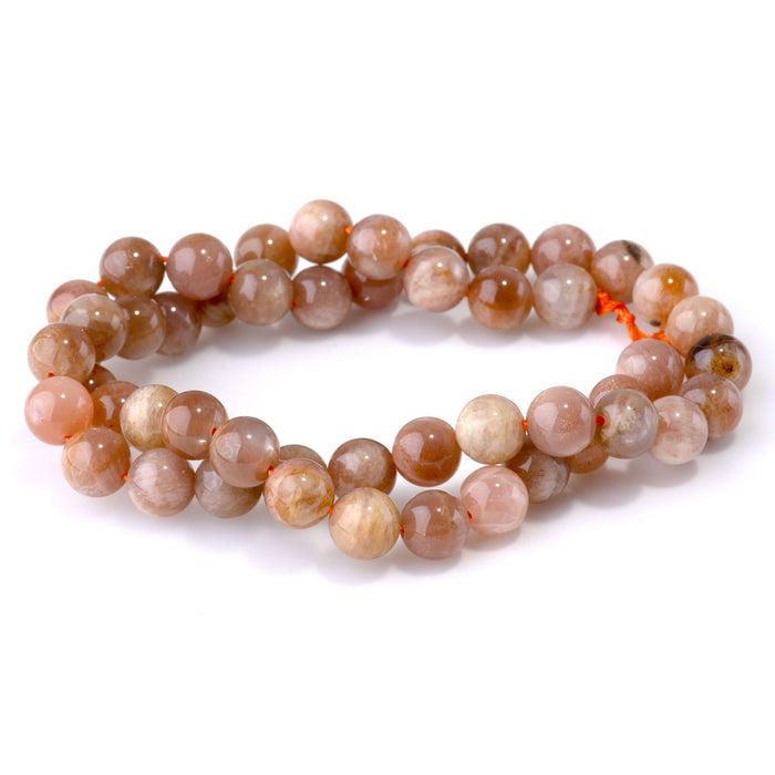 This is a Dakota Stones 8mm Golden Grey Moonstone Gemstone strand with round beads in 15-16 inch strand.