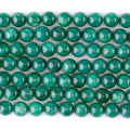 This is a Dakota Stones 8mm Green Mica Gemstone strand with A grade round beads in 15-16 inch strand.
