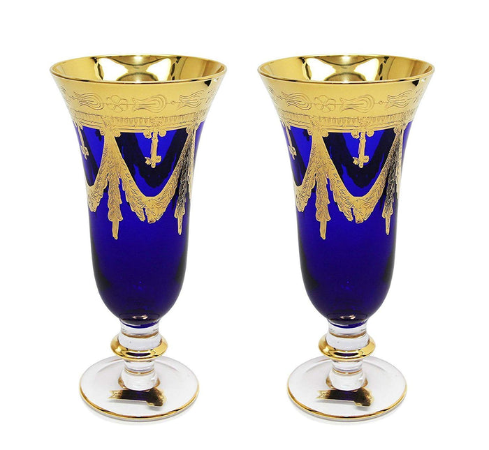 All six Interglass Italy blue crystal champagne flutes arranged together showing complete set