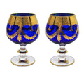 Side view of Interglass Italy blue crystal snifter showing cobalt hue and gold band detail