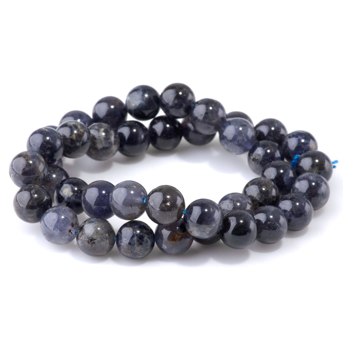 This is a Dakota Stones 10mm Iolite Gemstone strand with A grade round beads in 15-16 inch strand.