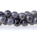 This is a Dakota Stones 6mm Iolite Gemstone strand with A grade round beads in 15-16 inch strand.