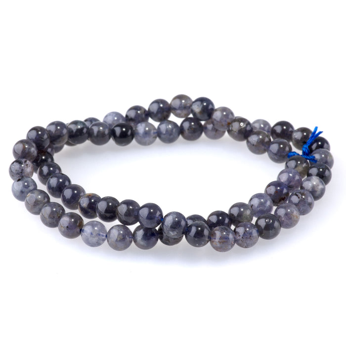 This is a Dakota Stones 6mm Iolite Gemstone strand with A grade round beads in 15-16 inch strand.