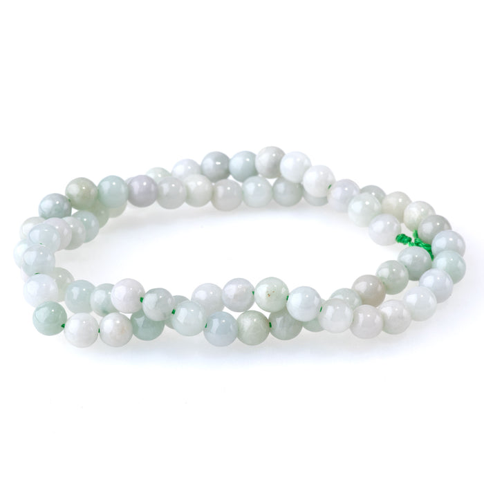 This is a Dakota Stones 6mm Jadite Gemstone strand with A grade round beads in 15-16 inch strand.