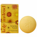 A round yellow Kate McLeod Sun Stone next to two orange and yellow packaging boxes against a white background.