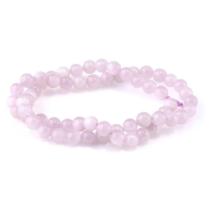 This is a Dakota Stones 6mm Kunzite Gemstone strand with AA grade round beads in 15-16 inch strand.