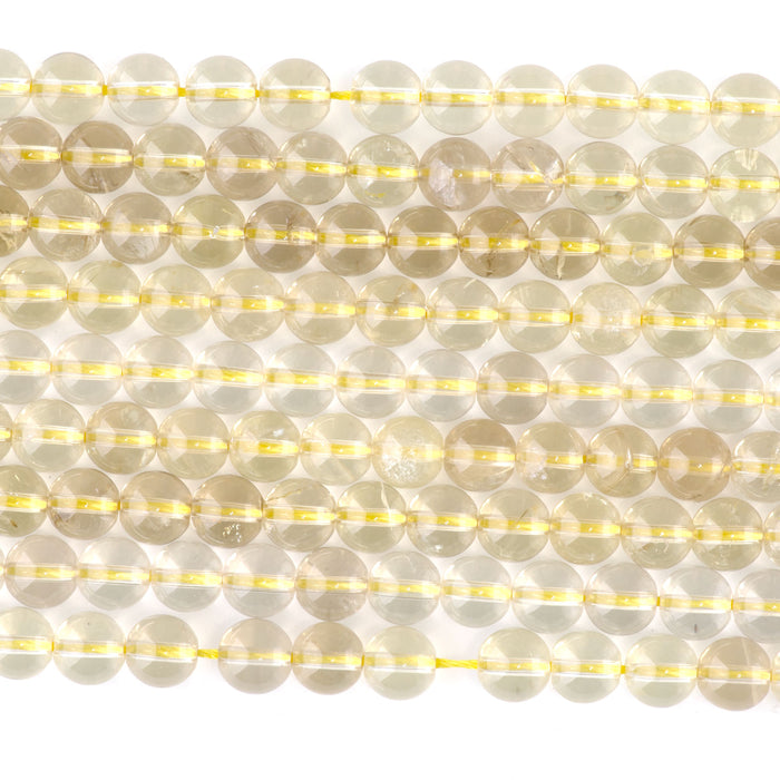 This is a Dakota Stones 6mm Lemon Quartz Gemstone strand with round beads in 15-16 inch strand.