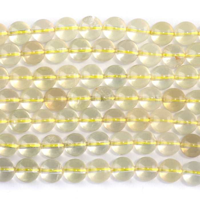 This is a Dakota Stones 8mm Lemon Quartz Gemstone strand with round beads in 15-16 inch strand.