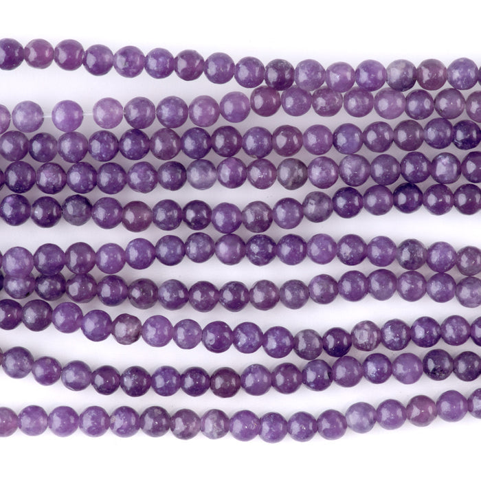 This is a Dakota Stones 4mm Light Lepidolite Gemstone strand with round beads in 15-16 inch strand.