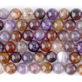 This is a Dakota Stones 10mm Mixed Dark Lepidocrocite Gemstone strand with round beads in 15-16 inch strand.