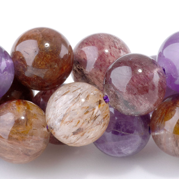 This is a Dakota Stones 10mm Mixed Dark Lepidocrocite Gemstone strand with round beads in 15-16 inch strand.