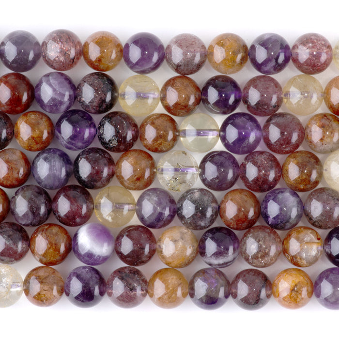 This is a Dakota Stones 8mm Mixed Dark Lepidocrocite Gemstone strand with round beads in 15-16 inch strand.