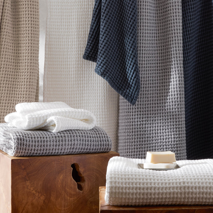 Matouk Cotton Waffle Bath Towels in Dove Grey, White, Dune, and Ink Dark Blue