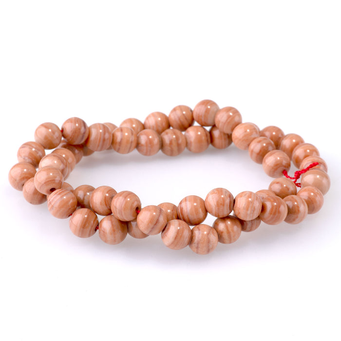 This is a Dakota Stones 8mm Red Malachite Gemstone strand with round beads in 15-16 inch strand.