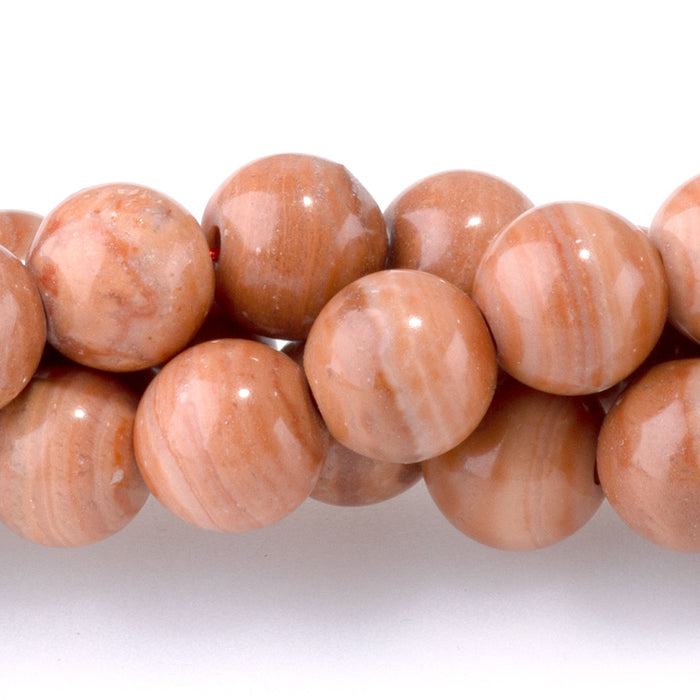 This is a Dakota Stones 8mm Red Malachite Gemstone strand with round beads in 15-16 inch strand.