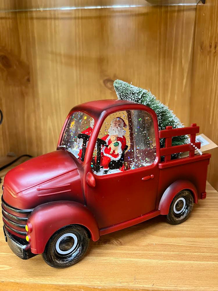 SPINNING RED PICKUP TRUCK with Santa at the Wheel Snow Globe